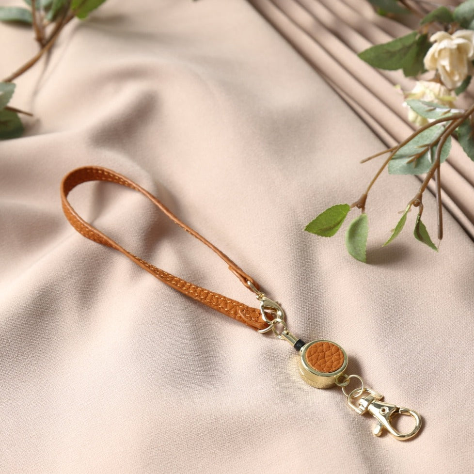 本革バイカラーリール付きストラップ