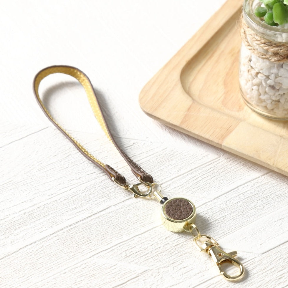 本革バイカラーリール付きストラップ